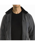 Operator wearing the Arc'teryx LEAF Atom LT Gen 2.1 tactical jacket unzipped, showcasing breathable fit and easy layering for high-mobility missions and range use.