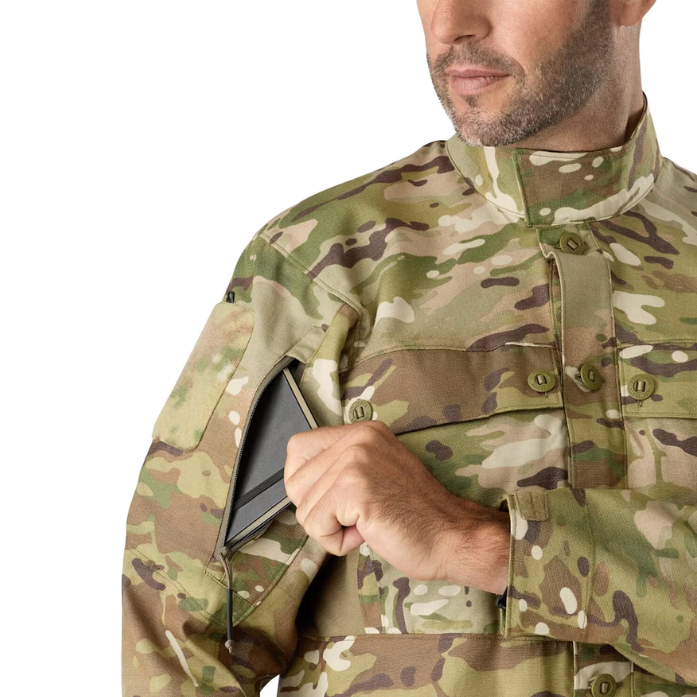 Close-up of Arc'teryx LEAF Recce Shirt LT sleeve showing zippered arm pocket for secure storage during tactical operations