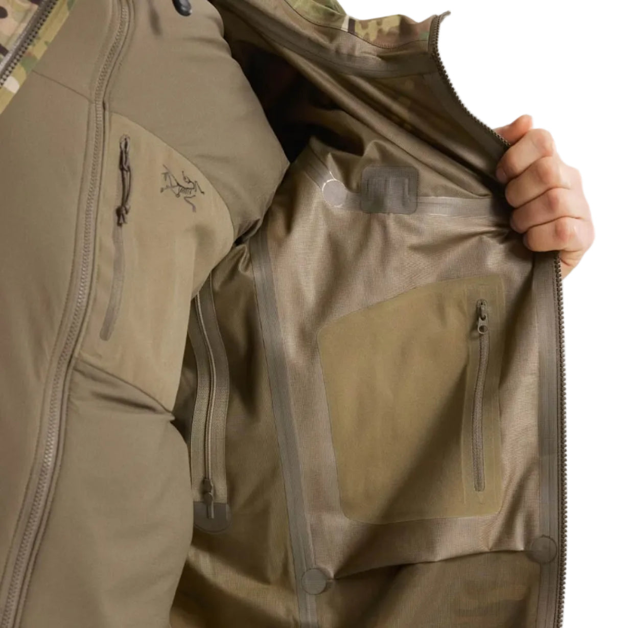 Interior view of Arc'teryx PRO Alpha Jacket GEN 2.1 Multicam showing GORE TEX 3 layer construction and seam taping engineered for waterproof protection in extreme environments