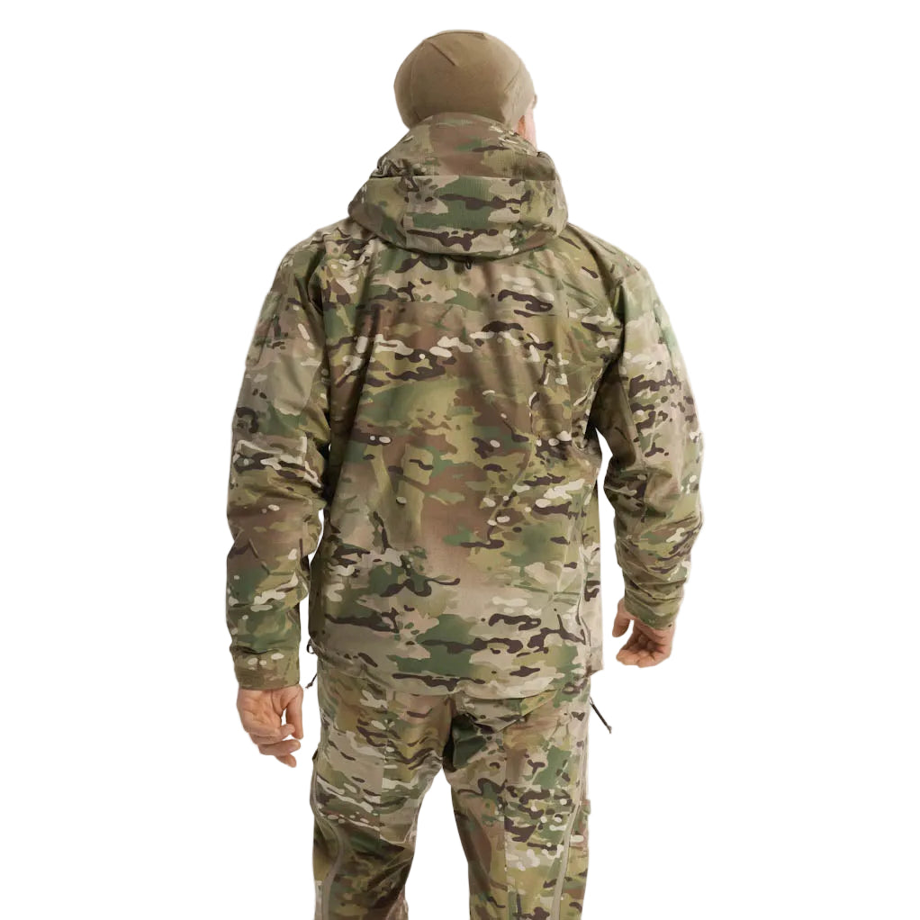Rear view of Arc'teryx PRO Alpha Jacket GEN 2.1 Multicam worn in operational environment, military fit GORE TEX jacket designed for load bearing compatibility and weather resistance