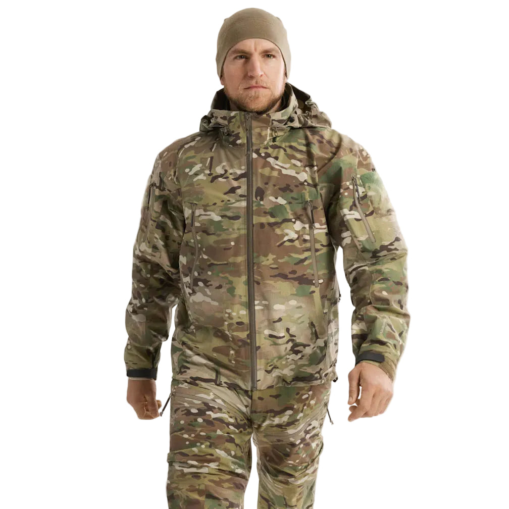 Arc'teryx PRO Alpha Jacket GEN 2.1 Multicam worn from the front during field operations, lightweight military rain shell designed for layering over armor and tactical gear