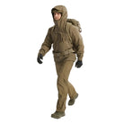 Full body view of the Arc'teryx PRO Alpha LT Jacket Gen 2.2 in Crocodile being worn, showing the streamlined military fit, weatherproof GORE TEX 3 layer construction, and low profile design originally developed within the Arc'teryx LEAF program. Displays mobility and coverage suited for tactical operations and wet weather field environments.
