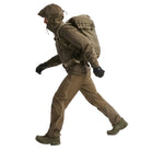 Full body side view of the Arc'teryx PRO Alpha LT Jacket Gen 2.2 in Ranger Green showing the Arc'teryx arm logo placement, streamlined jacket length, and lightweight GORE TEX 3 layer construction. This PRO-series shell, evolved from the Arc'teryx LEAF line, demonstrates mobility, weather protection, and a low profile fit for tactical field operations.