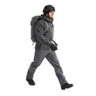 Full body view of the Arc'teryx PRO Alpha LT Jacket Gen 2.2 in Wolf Grey being worn, showing the streamlined military fit, lightweight GORE TEX 3 layer construction, and low profile PRO-series design evolved from the Arc'teryx LEAF line. Demonstrates mobility, coverage, and wet weather protection for tactical field environments.