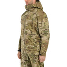 Arc'teryx PRO Alpha LT Gen 2.1 Multicam side angle showing StormHood integration and ergonomic cut designed for compatibility with plate carriers and tactical loadouts