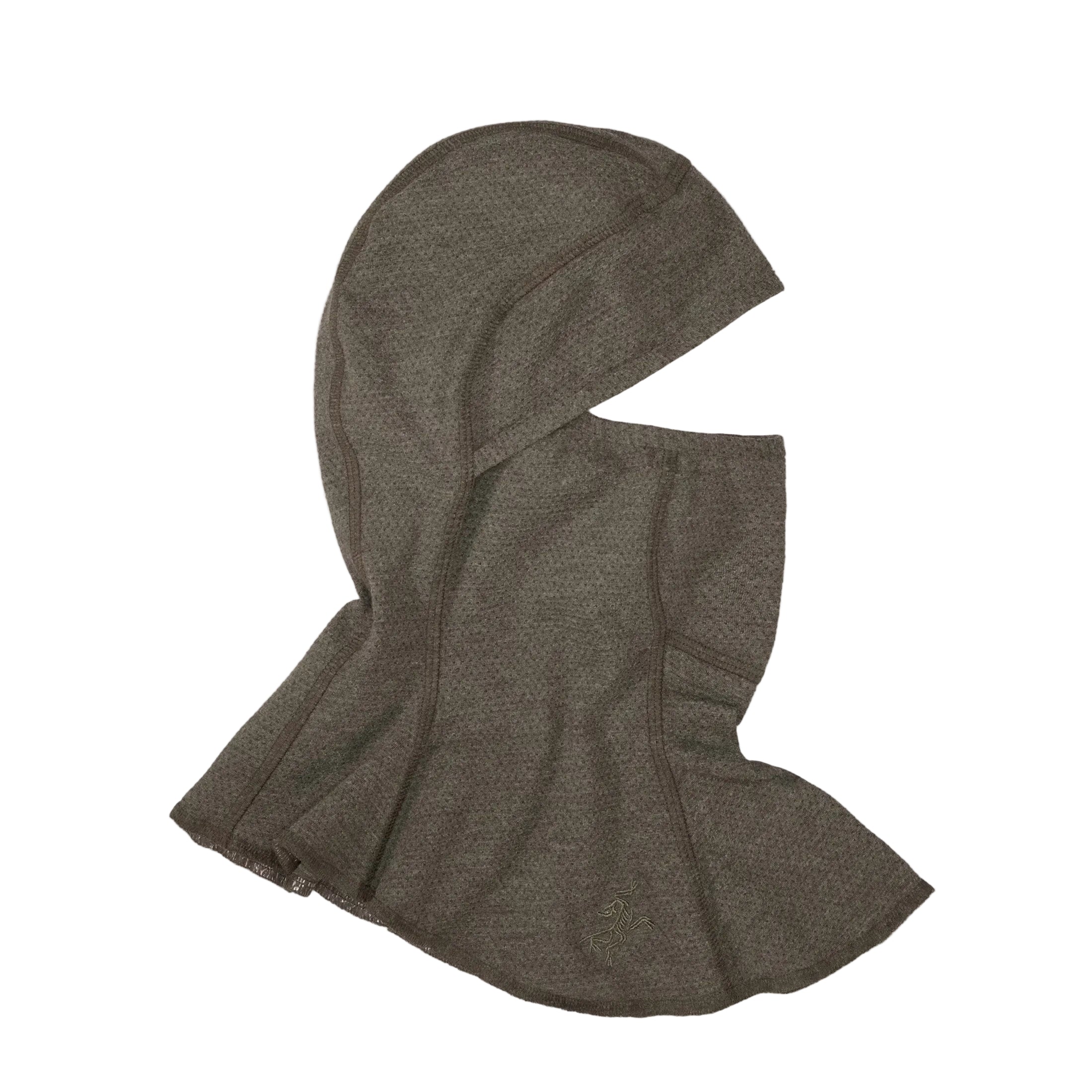 Flat lay image of the Arc'teryx PRO Assault Balaclava FR Gen 2 in Ranger Green showing the full-coverage flame resistant Defender M mesh knit, anatomical shaping, and low-profile construction. Highlights its FR performance, breathability, and compatibility with tactical helmets and PPE for direct action and high-risk environments.