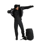 Full body view of Arc'teryx PRO Atom LT Jacket Gen 2.1 in Black being put on, lightweight breathable insulated field jacket designed for reconnaissance, tactical layering under armor, and high mobility cold weather operations
