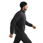 Side profile of Arc'teryx PRO Atom LT Jacket Gen 2.1 in Black showing athletic cut and articulated fit, breathable insulated tactical mid layer optimized for mobility, range movement, and load bearing gear compatibility