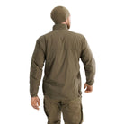Rear view of Arc'teryx PRO Atom LT Gen 2.1 in Crocodile being worn in the field, breathable tactical mid layer with articulated shoulders and stretch side panels built for armor compatible performance
