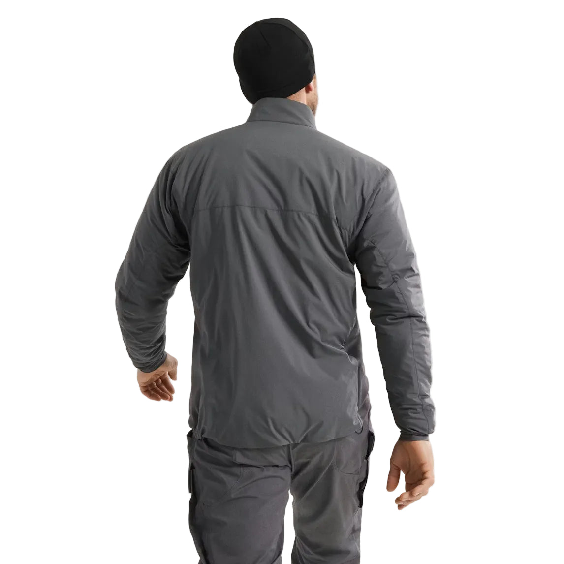 Rear view of Arc'teryx PRO Atom LT Gen 2.1 Wolf Grey worn in operational setting, breathable insulated reconnaissance jacket designed for mobility under plate carriers and load bearing equipment