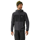 Front worn view of the Arc'teryx PRO Practitioner AR Hoody in Carbon Copy showing the athletic fit, ScubaHood design, and breathable Fortius Air 50 fabric as worn in the field, highlighting real world tactical performance for operators and outdoor professionals in the United States.