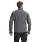 Back view of the Arc'teryx PRO Practitioner AR Jacket in Wolf Grey being worn, showing the articulated patterning, drop hem, and streamlined Fortius Air 50 shell. Highlights the PRO-series mid layer’s breathable Octa Loft insulation, low-bulk tactical design, and unrestricted mobility for high-output missions, professional field use, and cold-weather layering systems.