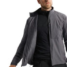 Arc'teryx PRO Practitioner AR Jacket in Wolf Grey worn open to reveal the Octa Loft insulation and breathable Fortius Air 50 interior structure. Shows how the tactical mid layer traps warmth while staying air-permeable, making it ideal for high-output missions, cold-weather layering systems, and anyone researching Arc'teryx PRO insulation performance or mid-layer construction details.
