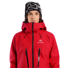 Close front detail view of the Arc'teryx Women’s Alpine Guide Jacket showing the women’s technical GORE TEX PRO construction and features available on sale in the Arc'teryx collection.