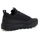 Black Arc'teryx trail running shoe on a white background