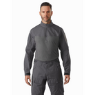 Front view of the Arc’teryx PRO Assault Combat Shirt in Wolf Grey. Built with no melt/no drip NYCO Cordura® ripstop and Cyberknit jersey, this tactical combat shirt is PPE-compatible, features a low-profile zip neck, articulated construction, and is designed for body armor integration in direct action missions.