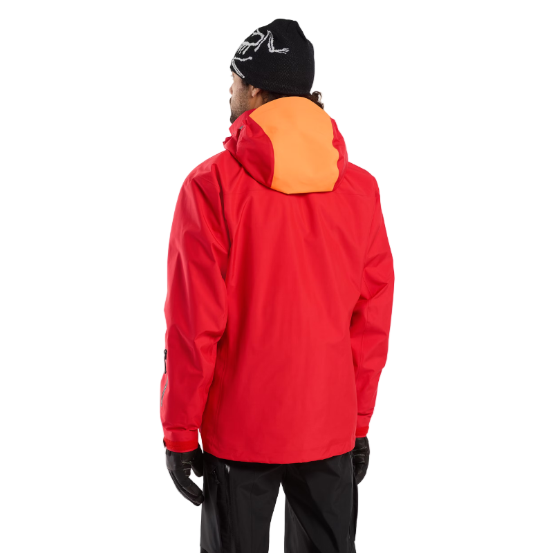 Back view of the Arc’teryx Ski Guide Jacket in Dynasty red, featuring the bright high-visibility DropHood™ for patrol and rescue identification- professional GORE-TEX PRO gear on clearance.