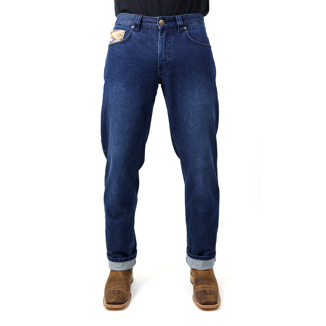 Blue jeans worn by a person on a white background