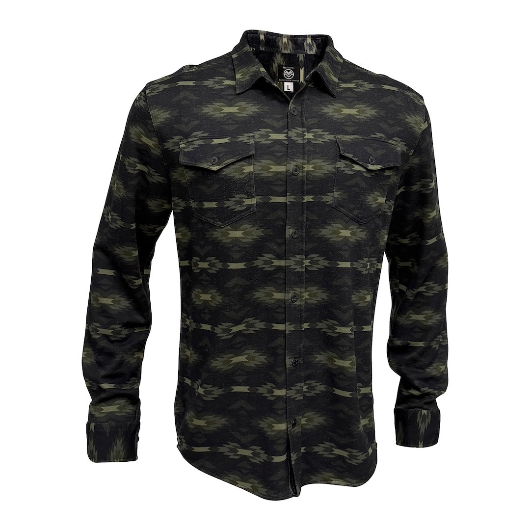 A long-sleeve button-up shirt with a dark aztec pattern in black and olive green, featuring two chest pockets and a pointed collar, shown against a plain white background.