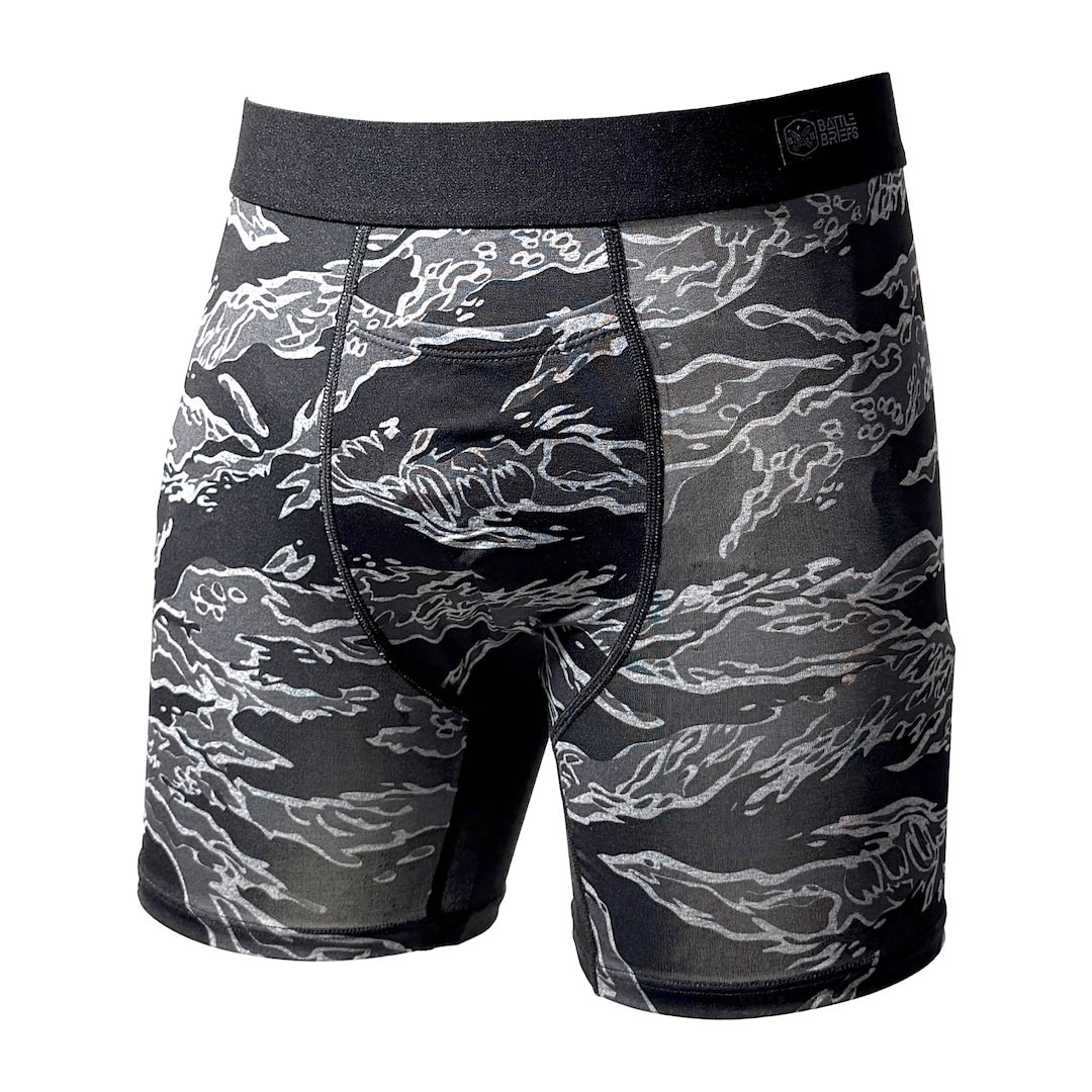 Front view of Battle Briefs Core Performance Boxer Briefs in Black Tiger Stripe featuring a black and gray tiger stripe pattern, no-ride fit, and quick-drying performance fabric.