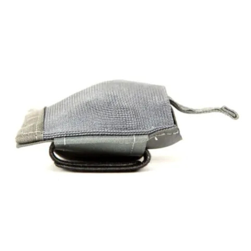 Folded Blue Force Gear Belt Mounted Dump Pouch showing its compact low-profile design for snag-free carry on belts and tactical gear.