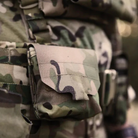 Close-up of the Blue Force Gear Boo Boo Kit Pouch showing the BLIP pull tab and secure flap closure for quick access.