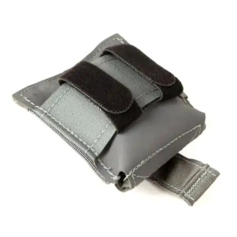 Close-up of the Blue Force Gear dump pouch rear showing Velcro hook and loop belt attachment system for secure mounting