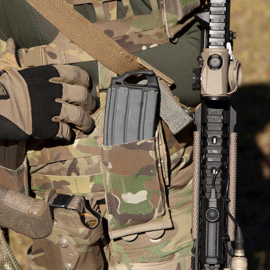 Close-up of the Blue Force Gear Ten-Speed Single M4 Mag Pouch attached to tactical gear, highlighting secure magazine retention and compact design.