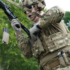 Blue Force Gear Ten-Speed Triple M4 Mag Pouch installed on tactical plate carrier during range training showing lightweight triple rifle mag storage system