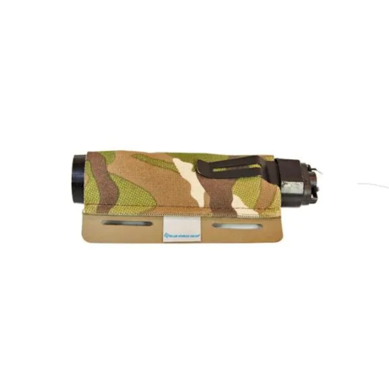 Side profile of the Blue Force Gear The Hammock showing its slim, snag-resistant design for mounting under MOLLE-compatible pouches.