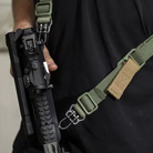 Blue Force Gear ULoop used in a tactical rifle sling configuration, delivering quiet operation and reliable weapon retention during movement.