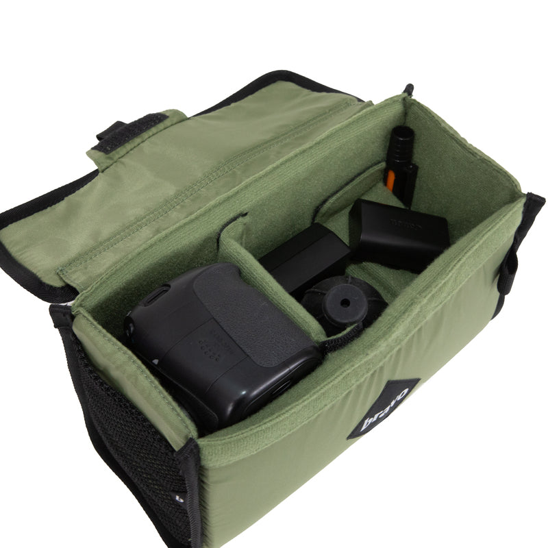 Bravo Co Buffer Block I in Drab opened to show the microfiber-lined interior, adjustable Velcro dividers, and organized camera gear storage.