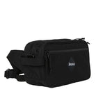 Side profile of the Bravo Co Flee Block I Black highlighting the compact depth, durable Cordura exterior, and carry strap attachment points.
