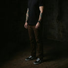 Lifestyle photo showing the Carlos Ray V3 Tactical Pants styled as normal everyday pants, highlighting their discreet, non-tactical appearance while still offering hidden EDC features and functional storage without broadcasting tactical use.