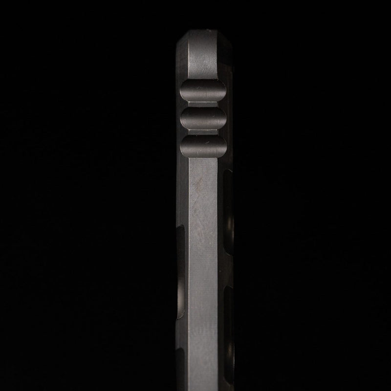 Dynamis Combat Flathead Gen 2 blade-free pry tool handle detail highlighting ergonomic grip and corrosion resistant finish