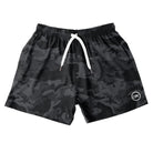 Front view of Cove Black Camo Athletic Shorts made from recycled plastic bottles. These 5" inseam performance shorts feature an elastic waistband with drawstring and zippered side pockets for secure storage. Made from 90% recycled polyester and 10% spandex, they offer comfort and mobility for gym, swim, or lounging.
