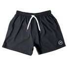 Cove Black Performance Shorts made from recycled plastic bottles, designed for gym, swim, or lounging. Featuring a 5" inseam, elastic waistband with drawstring, and zippered pockets for secure storage. Crafted from 90% recycled polyester and 10% spandex for lightweight comfort and mobility, these shorts fit true to size and are perfect for active lifestyles.