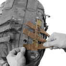 Crye Precision AVS 1000 Pack mounted directly to a Crye AVS plate carrier, showing modular integration as a rear plate bag or attached assault pack, low profile tactical backpack compatible with AVS and JPC systems for mission adaptable loadouts