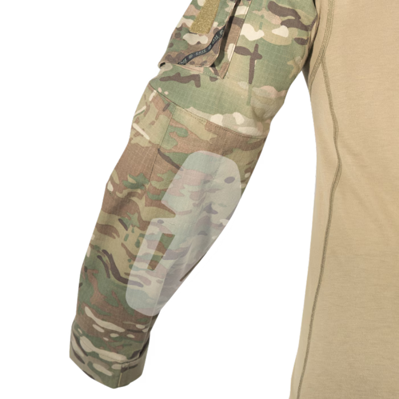 Close-up of the Crye Precision G3.5 Combat Shirt sleeve showing the VTX RIPSTOP fabric, shoulder pocket, elbow pad usage, and hook-and-loop attachment panel.