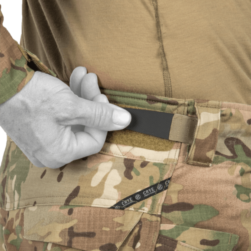 Detail view of Crye Precision G4 Combat Pants showing adjustable Velcro waist cinch tabs for a secure, custom fit. Built from VTX RIPSTOP™ stretch fabric for mobility, durability, and comfort in military, law enforcement, and range operations.