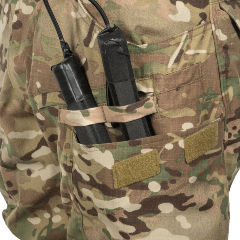 Close-up of Crye Precision G4 Combat Pants showing multiple cargo and utility pocket designs with reinforced seams, mesh venting, and internal organizers. Built from VTX RIPSTOP™ stretch fabric for military, law enforcement, and range operations.