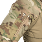 Close-up of the zippered expandable shoulder pocket on the Crye Precision G4 Combat Shirt showing the VTX RIPSTOP sleeve construction.