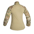 A women's long-sleeve tactical shirt shown from the back, featuring a solid tan body and multicam camouflage sleeves.