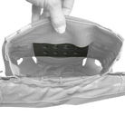 Crye Precision R-Series JPC Padded Insert being installed inside a plate carrier to provide additional comfort and reduce pressure from armor plates.