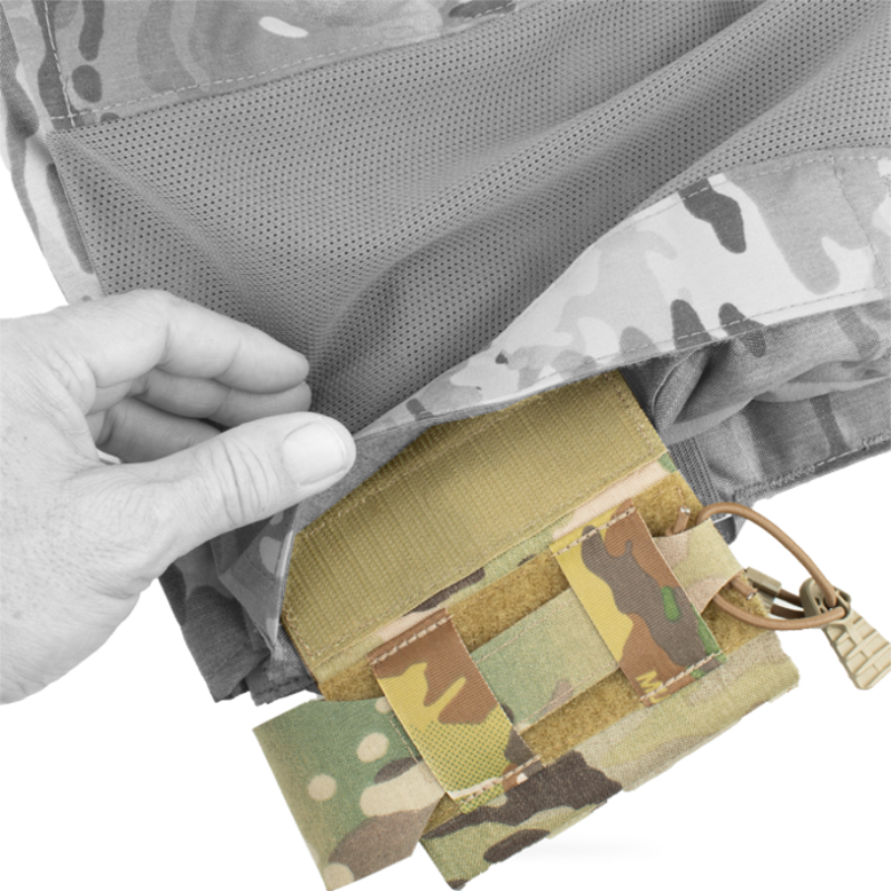Close-up of the Crye Precision R-Series M4 Side Pouch showing the Velcro side attachment interface and carrier integration system.