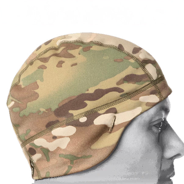 Side profile of Crye Precision SkullCap tactical beanie worn under helmet showing sunglass eyelets and streamlined fleece fit for cold weather operations