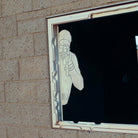 Window with a silhouette target sticking out of the side.