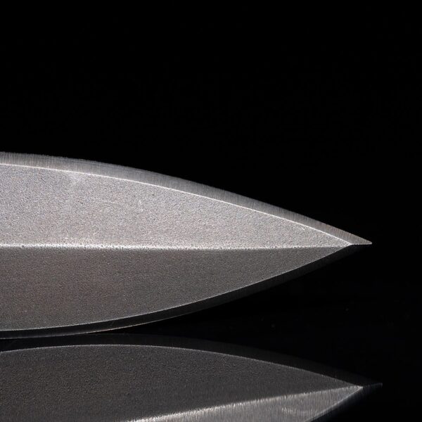 Close up of Dynamis x Winkler DYNAMIS Blade double edge 80CRV2 high carbon steel combat knife profile