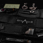 Dynamis Alliance LOPRO Belt displayed with everyday carry gear, highlighting concealed storage options for small tools and essential items.