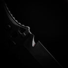 Close-up of the included line cutter tool from the Dynamis Neptune IWB Kit, showing robust construction for cord/strap cutting during emergency or utility tasks. Compact, low-profile design.